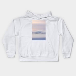 Dreamy thick fog at sunrise over hill Kids Hoodie